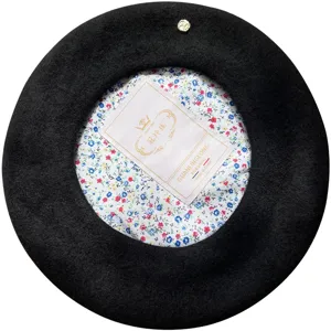 Boina de lana negra para mujer sombrero pintor vintage con forro floral y insignia metálica.