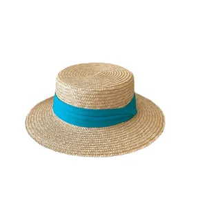 Vintage flat top straw hat with turquoise ribbon, ideal for summer sun protection and beach.
