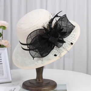 Elegant lace sun hat for women, french style wide brim beach hat with black mesh bow and floral decor.