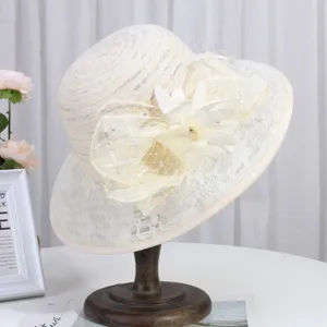 Elegant women lace sun hat detail view, floral mesh bow beach cap for summer outdoor travel.