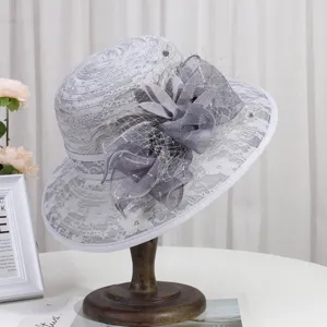 Close-up of elegant grey lace sun hat detail, exquisite floral mesh decoration, chic summer style.