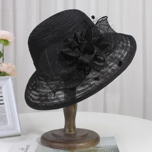 Elegant black lace sun hat with floral mesh design, perfect for summer outdoor fashion wear.