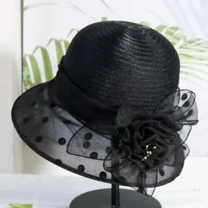 Black organza polka dot sun hat for women, breathable floral mesh bucket hat detail.