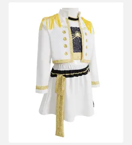 Detailed view of white children performance costume featuring gold tassels and belt.