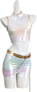 Close-up detail of the holographic white crop top and shorts set featuring striking gold chain belts.