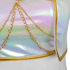 Holographic white children cosplay stage costume detail with gold chains and metallic trim.