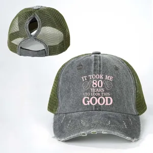 Distressed ponytail baseball cap with funny 80th birthday text, adjustable mesh trucker hat.