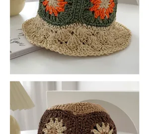 Handgemachte Häkelblumen Fischerhut Detailaufnahme, natürliche Strohhut Textur Ansicht.