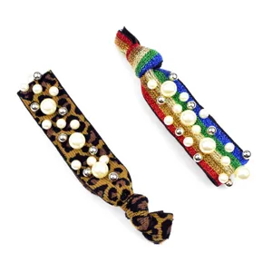 Elastici per capelli in tessuto leopardato e arcobaleno con perle, accessori alla moda.