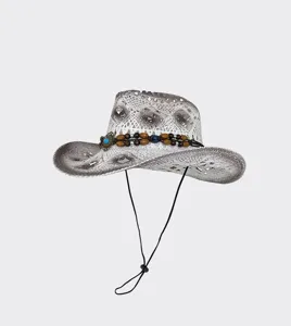 Sombrero de vaquero de paja calada vintage con cuentas y barbiquejo para la playa.
