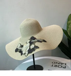 Details zum Damen Strohhut mit breiter Krempe und eleganter Blumenstickerei für den Sommerstrand.