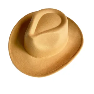 Close-up detail view of the classic camel felt fedora western cowboy hat texture.