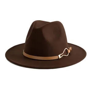 Close-up detail of the brown fedora hat featuring a stylish tan leather belt and metal buckle.