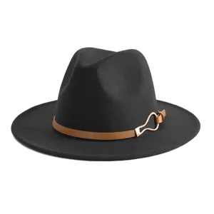 Close-up of the stylish black fedora hat featuring a brown leather belt strap and metal buckle.