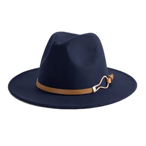Dark blue fedora hat with brown leather belt and gold metal buckle, stylish autumn accessory.