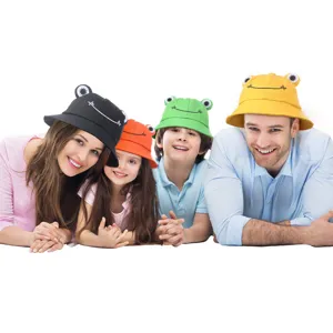 Cute frog bucket hats detail view, featuring funny cartoon eyes and bright colors.