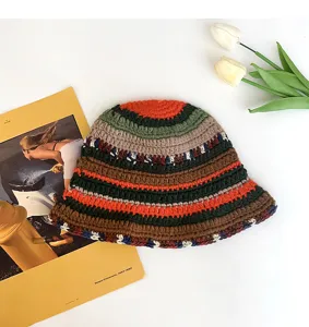 Handmade color block crochet bucket hat, colorful knitted winter fisherman hat detail.