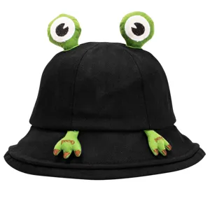 Close-up view of the black bucket hat showcasing detailed 3D green frog eyes and embroidered frog feet.
