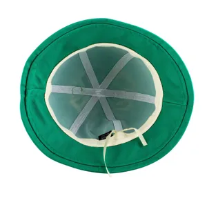 Green bucket hat detail view, cute frog style sun hat, casual cotton fisherman hat outdoor.