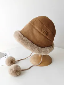 Winter warm suede bucket hat with faux fur trim and cute pom pom ties for women cold weather.