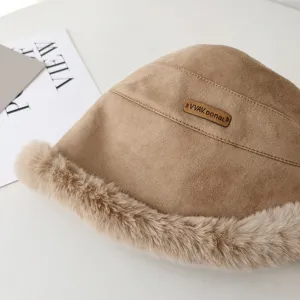 Winter warm faux suede bucket hat with cozy plush faux fur trim and chic leather patch detail.