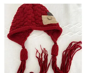 Red knitted earflap hat with tassels and pocket for women autumn winter sweet cute style.