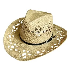 Close-up detail of women summer hollow straw sun hat raffia jazz hat with black belt decor