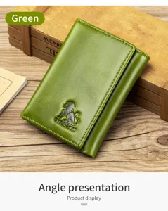Detailed close-up view of the green leather trifold wallet, showcasing fine texture and lion logo.