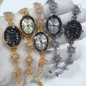 Elegant oval quartz watch for women with rhinestone snowflake bracelet, stylish detail view.