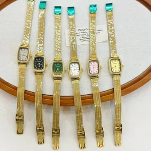 KOUSHI rectangular quartz women watch with gold mesh strap, vintage style detail view.