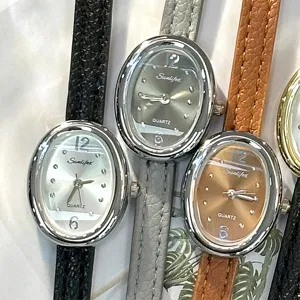 SUNLIFEX vintage style small oval dial quartz watch with slim leather strap for women.