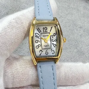 Kloris women's elegant tonneau quartz watch featuring blue leather strap and classic dial.