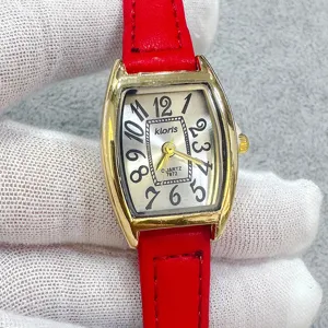 Kloris womens quartz watch with red leather strap and gold tonneau case elegant dial