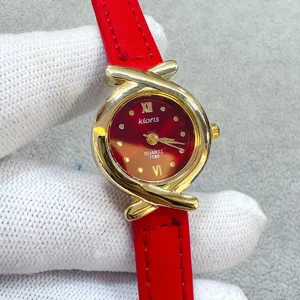 Kloris women's red leather strap quartz watch with stylish gold cross case and retro dial design.