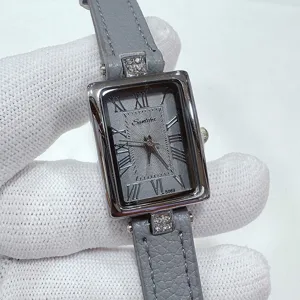 Elegante reloj de pulsera rectangular para mujer con correa de cuero gris y números romanos
