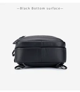 Black genuine leather chest bag bottom detail view, retro casual single shoulder crossbody bag.