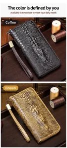 Genuine leather crocodile pattern long zipper wallet clutch with wrist strap for daily use.