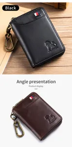 Detailed close-up view of genuine leather car key bag featuring metal hook and zipper.