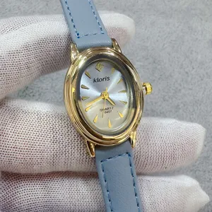 Kloris ovaal quartz horloge voor dames met blauwe lederen band en gouden kast vintage stijl