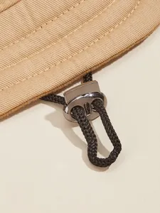 Verstellbares Haustier Sonnenhut Detail, khakifarbener Stoffrand mit Kordelstoppper.