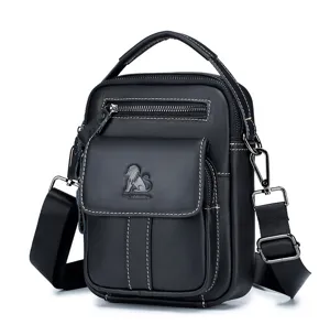 Close-up of premium genuine cowhide men messenger bag, black vertical style, metal lion logo.