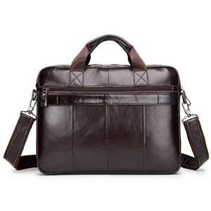Genuine leather men's business briefcase detail view, brown laptop bag texture and straps.