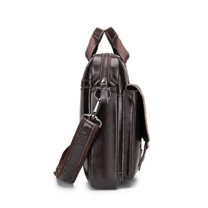 Men's leather business briefcase side view detail showing strap and handle construction