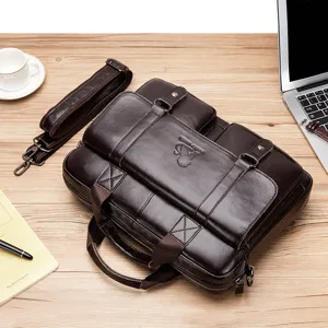 Leather laptop bag detail view, showing exquisite cowhide texture and professional business style.