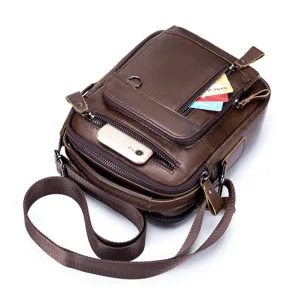 Detailed view of men's genuine leather crossbody bag with multiple zippered pockets and strap.