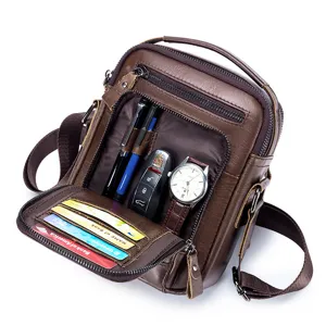 Detailed view of men's genuine leather cross-body bag with multiple interior compartments.