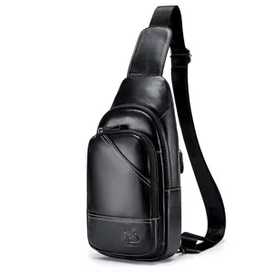 Genuine leather chest bag for men, black sling bag with multiple zipper compartments and adjustable strap.