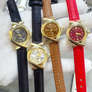 Detail shot of multi-color small dial quartz watches with leather straps and unique case.