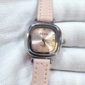 Detailed view of the kloris women's quartz watch featuring a pink leather strap and silver square dial.