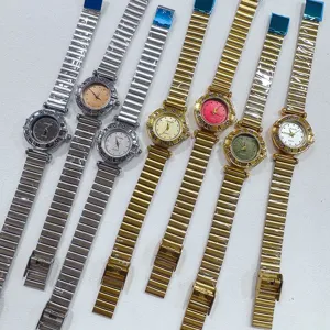SUNLIFEX vintage quartz horloge met metalen bamboe band, elegante damesdetails voor stijl.